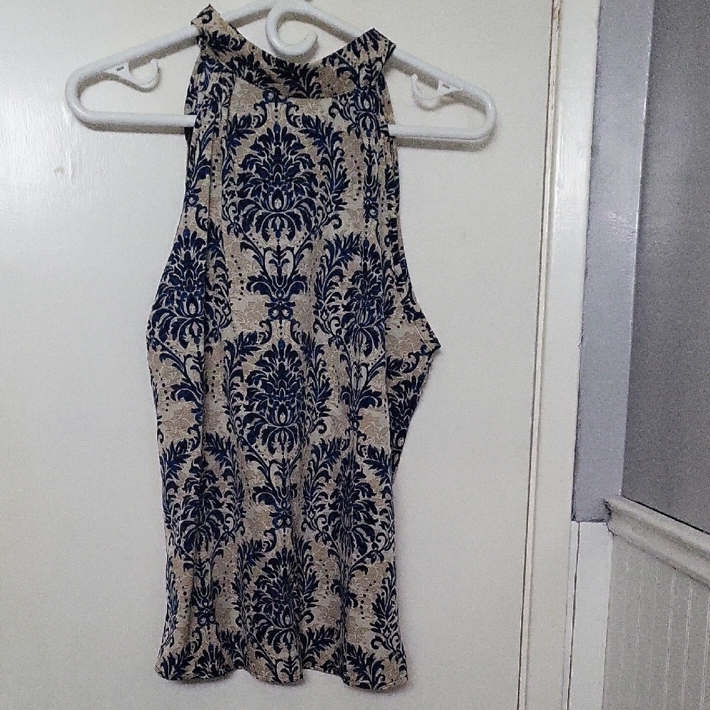 Elegant Blue and Cream Sleeveless Blouse